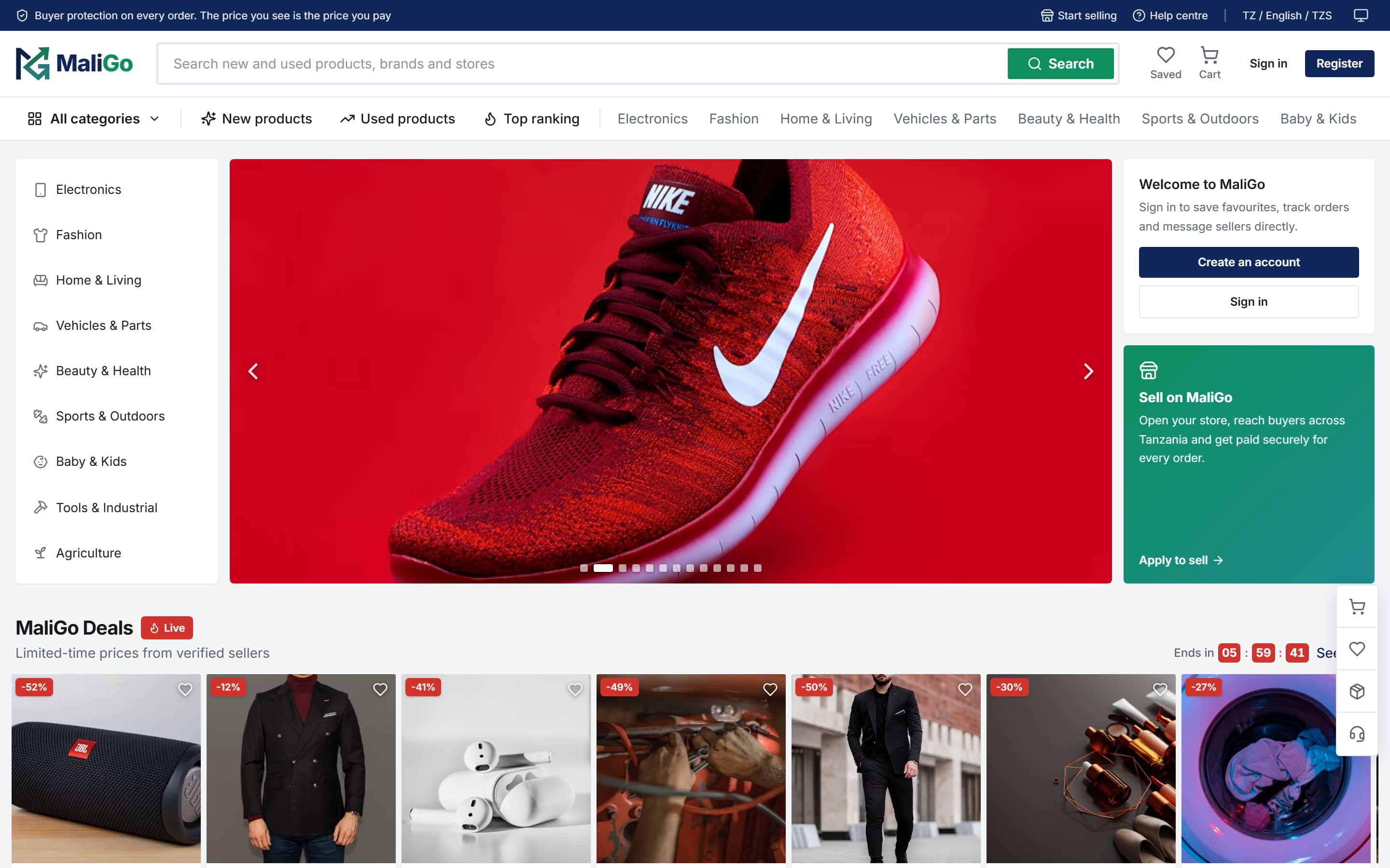 MaliGo home page on desktop in the light theme: product search, a category rail, a promotional carousel, sign-in and Sell on MaliGo panels, and a row of live deals from verified sellers.