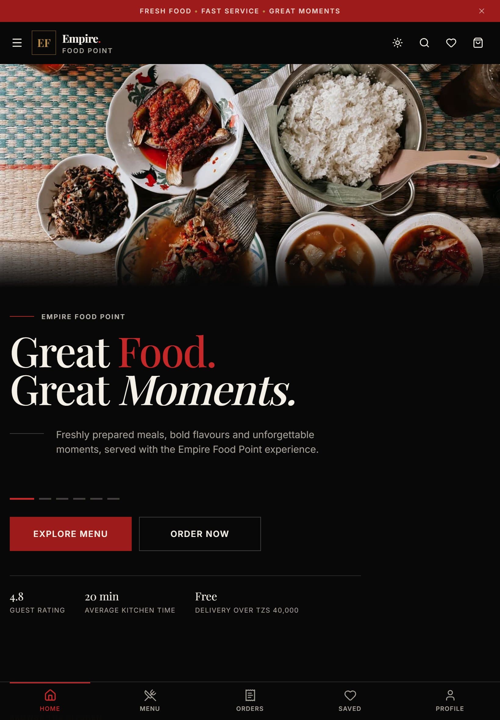 Empire Food Point home page on a tablet in the dark theme: a spread of Tanzanian dishes, the “Great Food. Great Moments.” headline, Explore menu and Order now buttons, guest rating, kitchen time and free-delivery threshold.